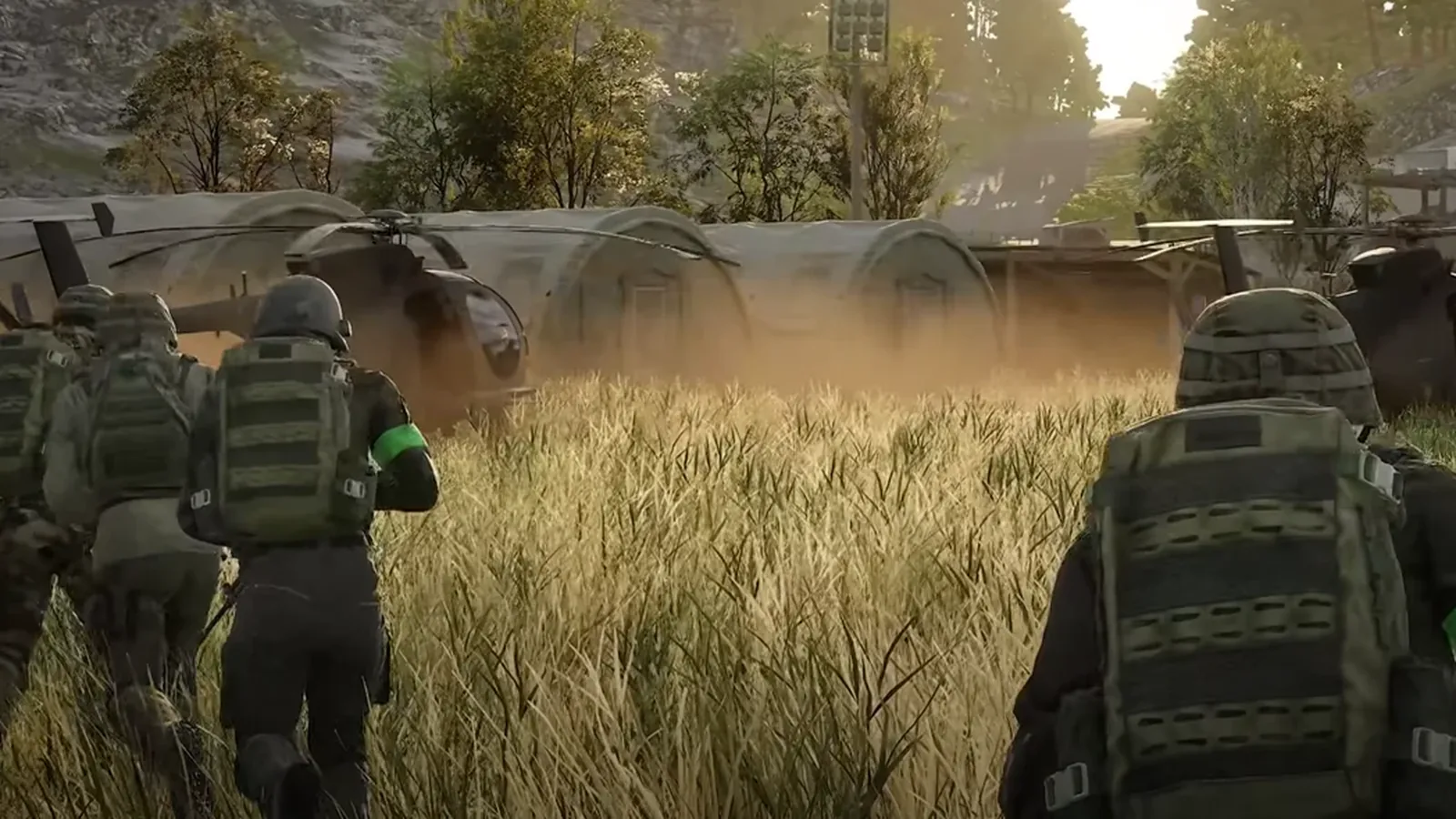 WARDOGS squad moving together near a transport helicopter